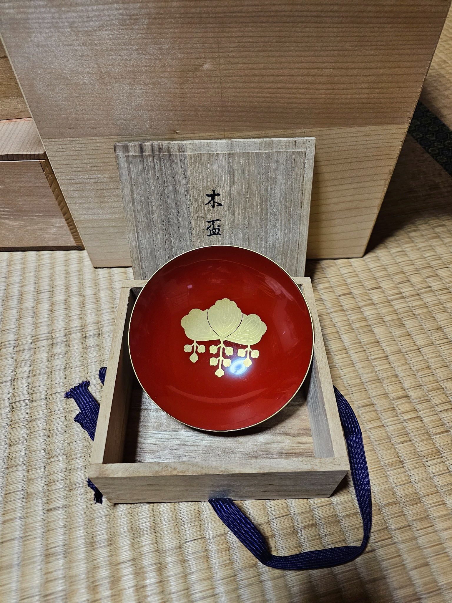 Ceremonial wooden sake cup in its box.