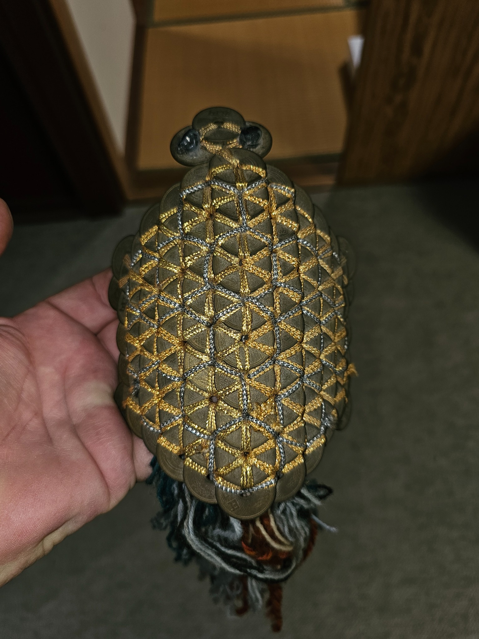 Old coin woven money charm from the Hanasaki house.