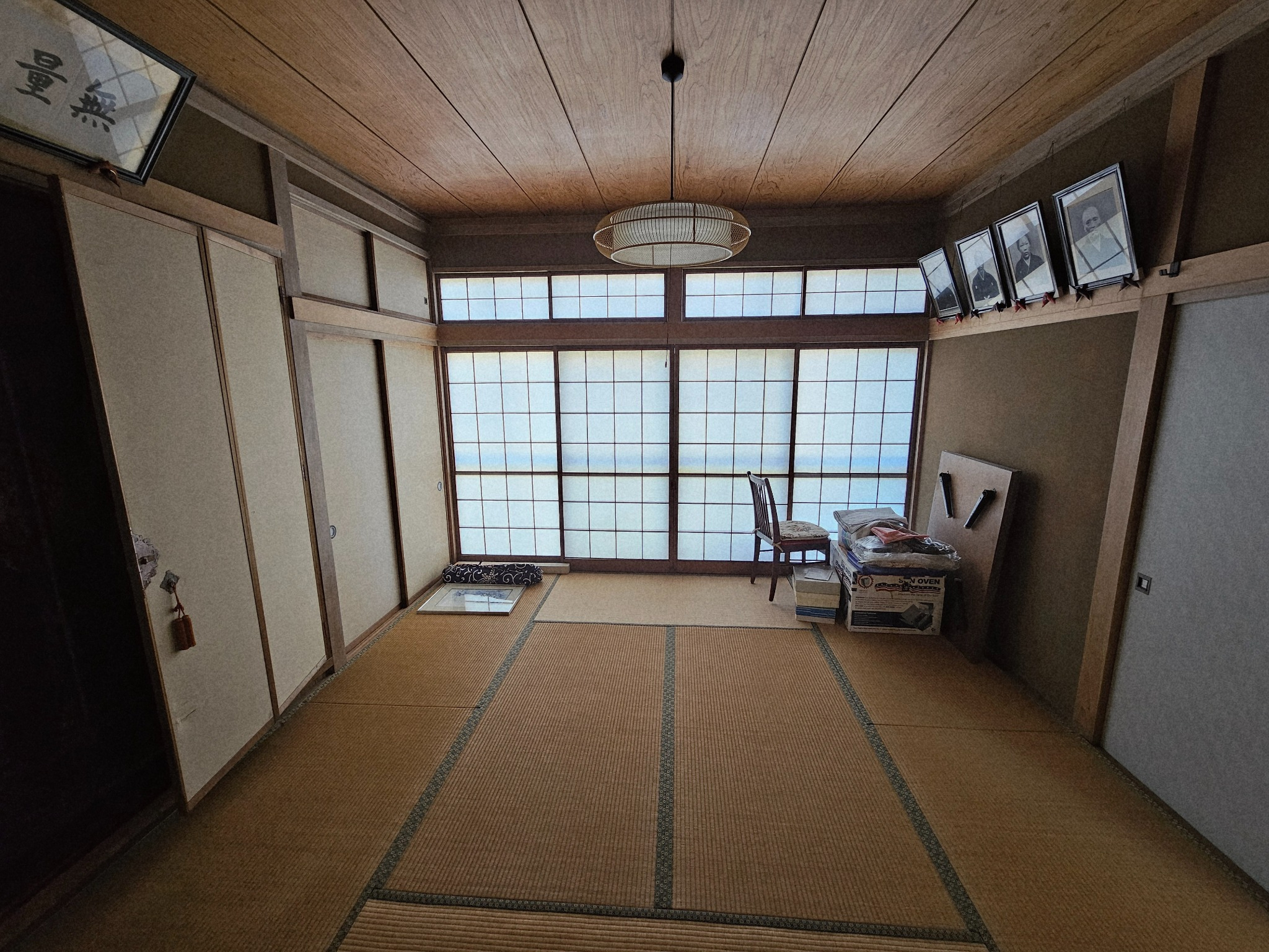 A room in the Hanasaki house with ancestor photographs.