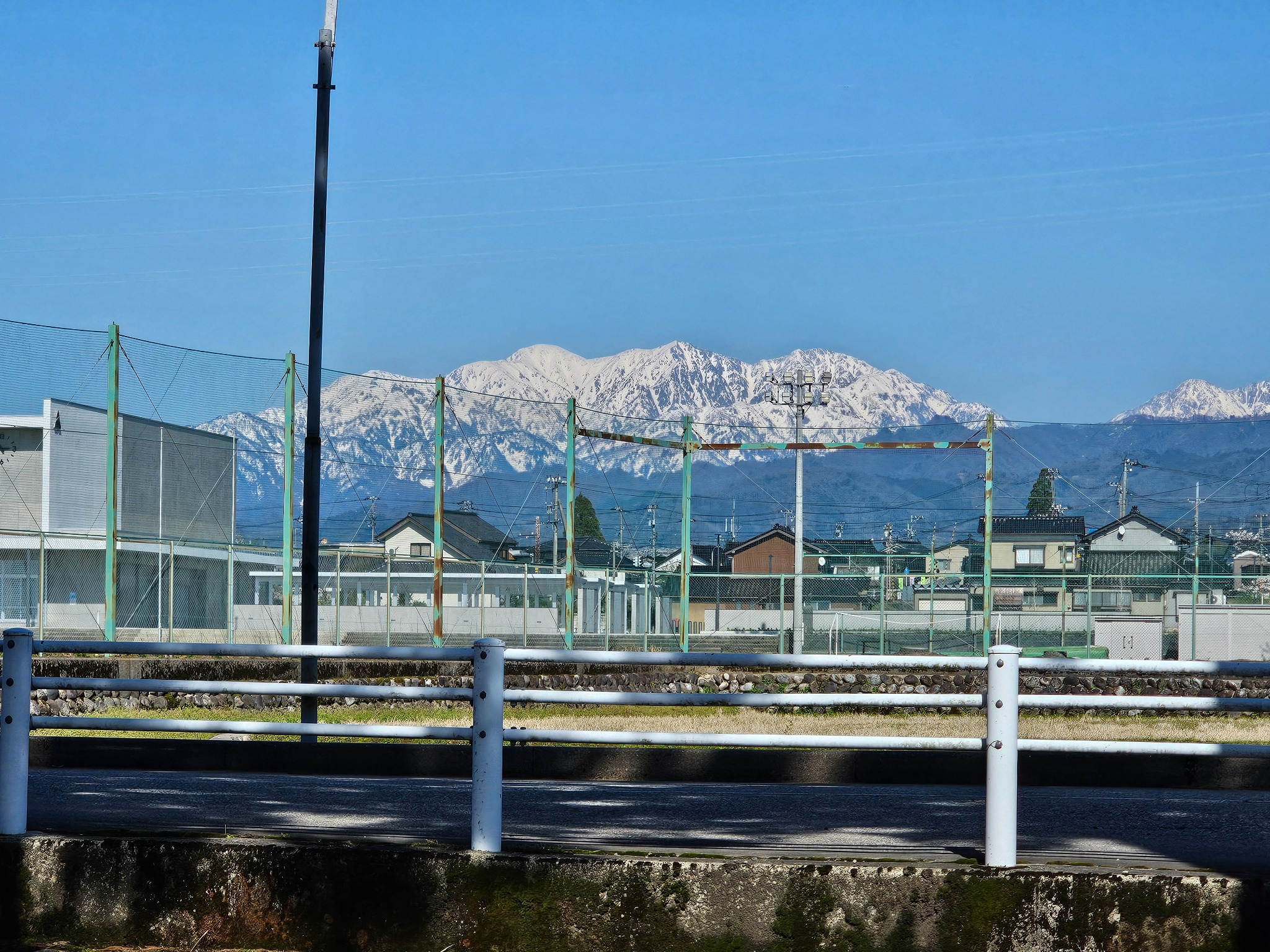 Snow mountains above the town near Hanasaki.