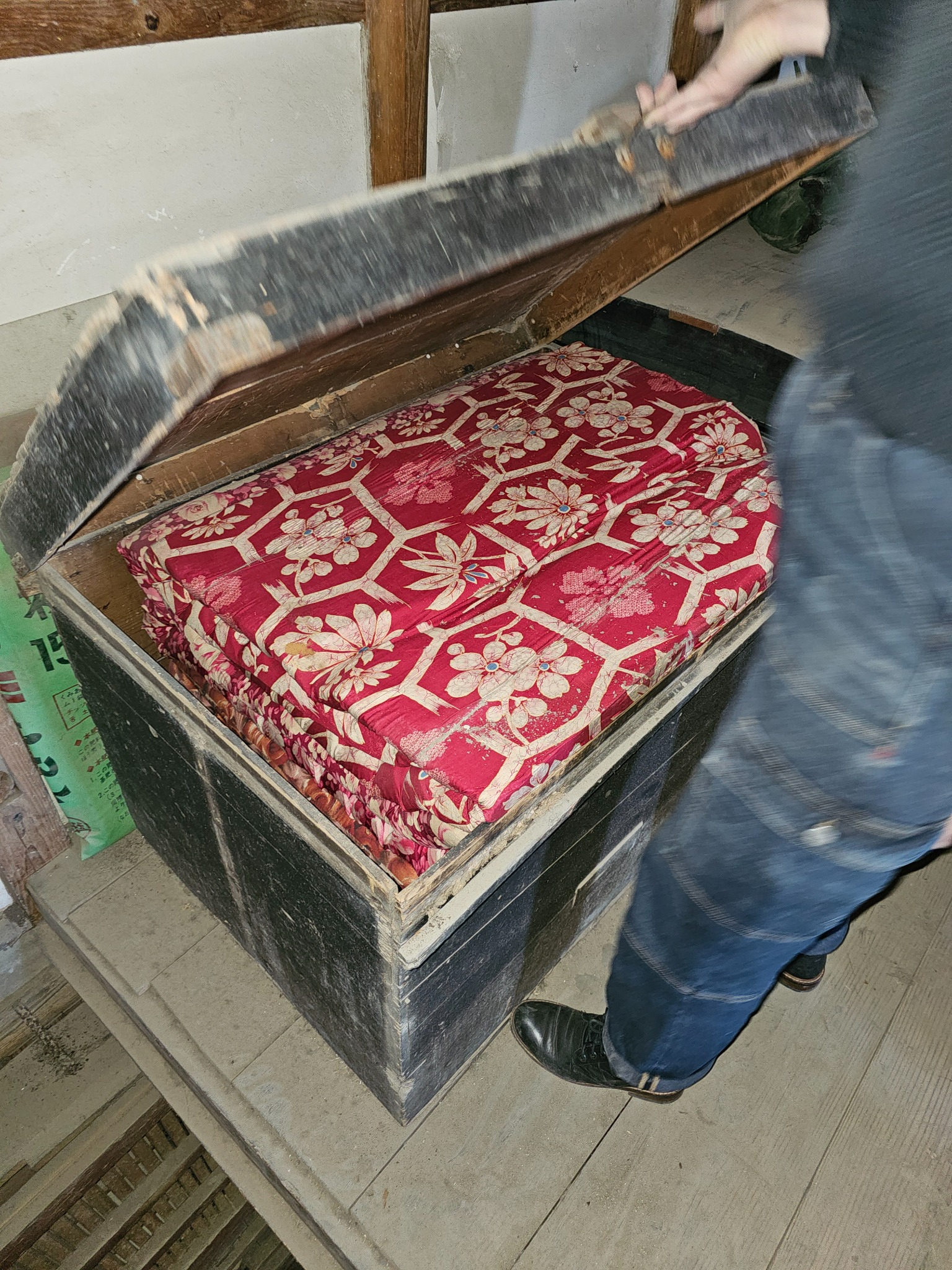 Large wooden tansu open.