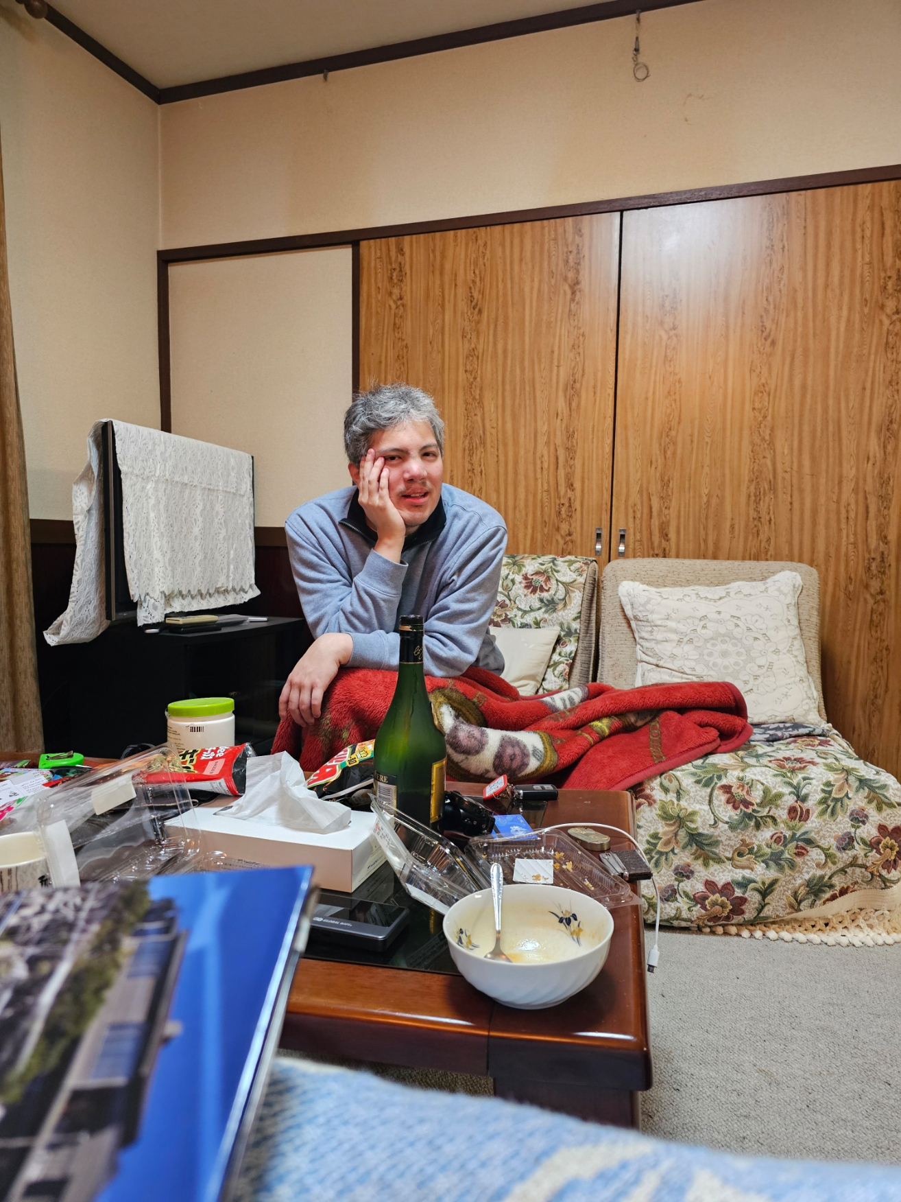 Tatsunari resting in the living room.