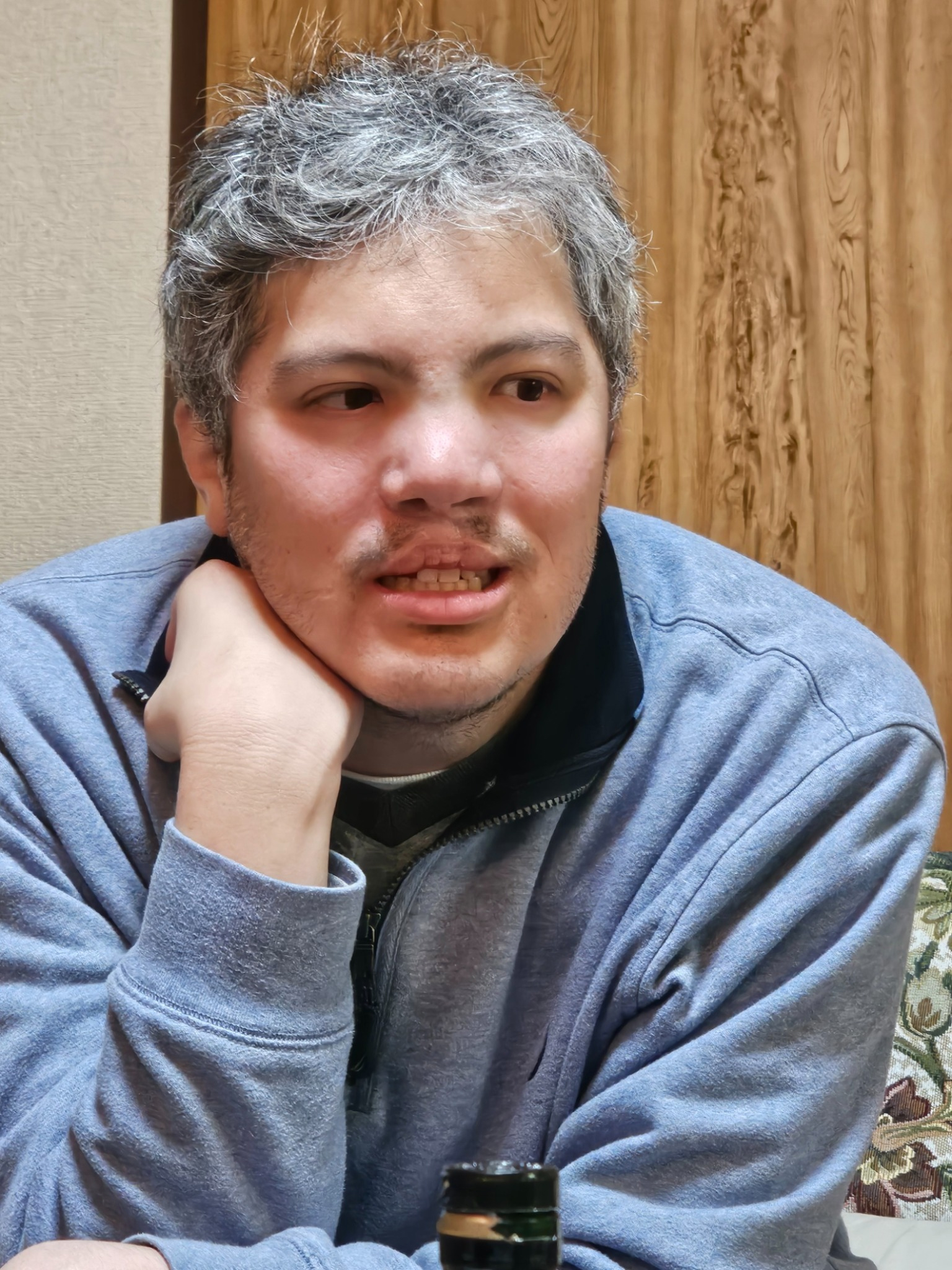 Close portrait of Tatsunari in the living room.
