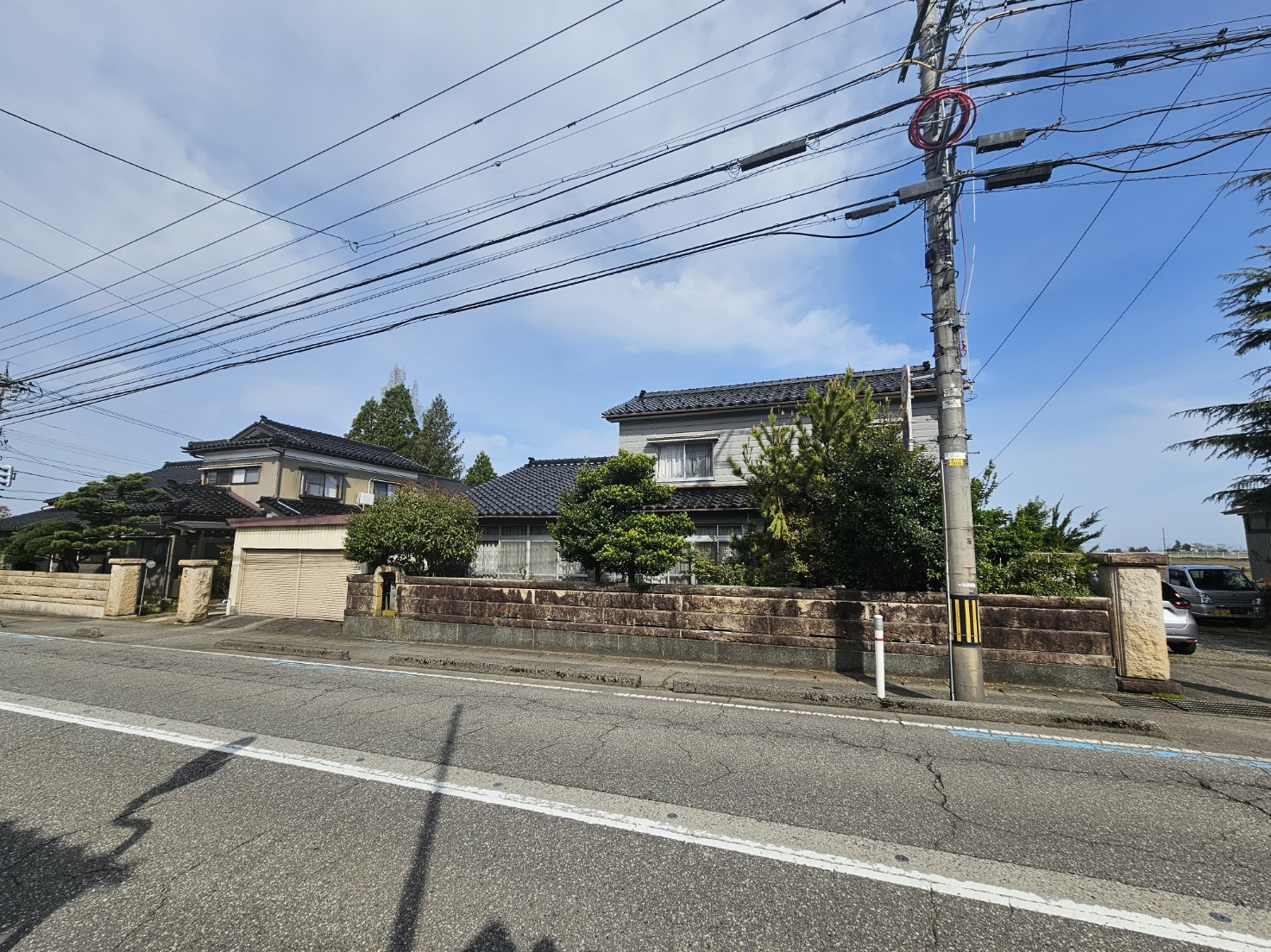 Wide view of the house across the street.