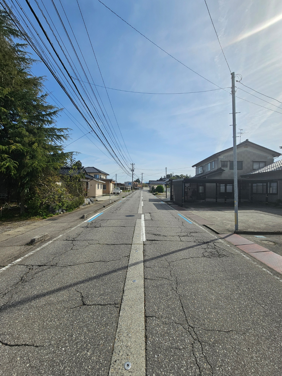 The main road in the opposite direction near the Hanasaki house.