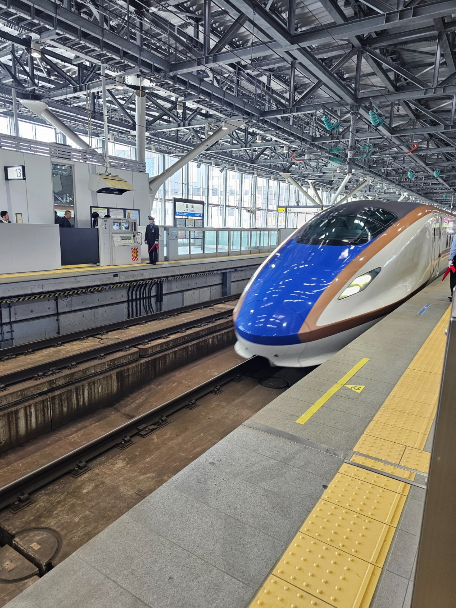 Shinkansen arriving at the platform.