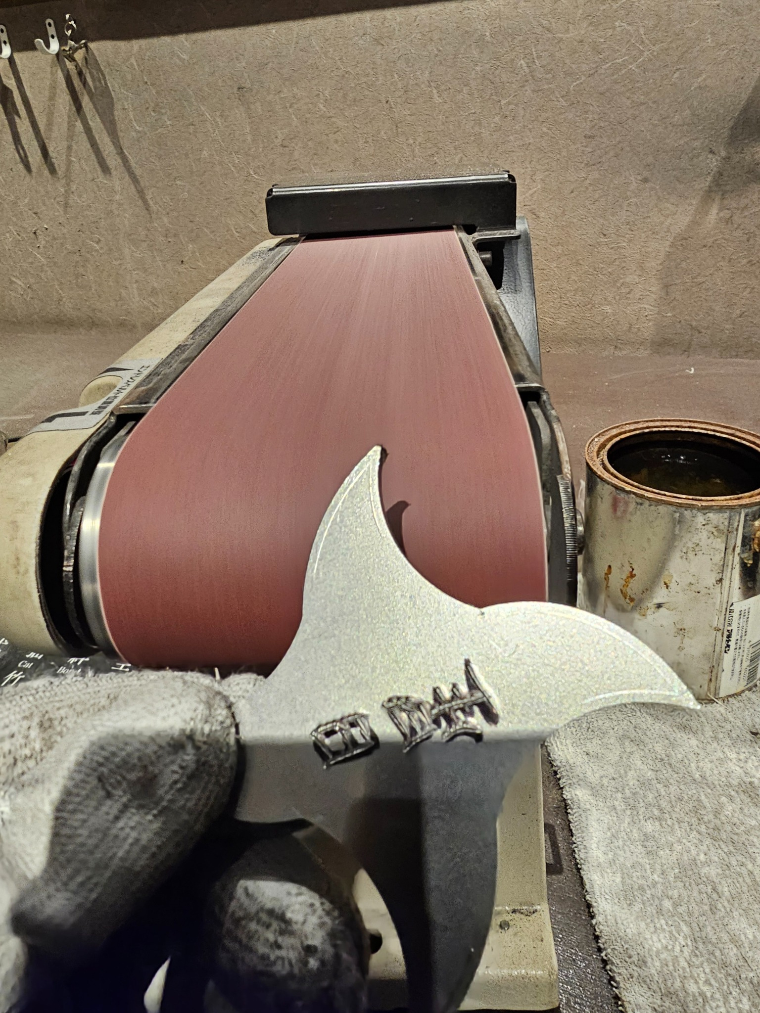 Shuriken on belt sander.